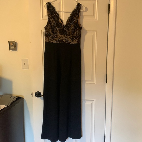 Black jumpsuit. Dressy. Size L. Boot cut bottom worn once - Picture 1 of 6